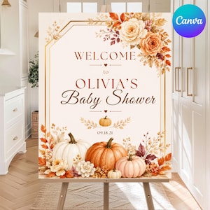 May include: A rectangular welcome sign for a baby shower featuring the text WELCOME to OLIVIA'S Baby Shower 09.18.21. The design includes a gold geometric border, watercolor illustrations of orange and white pumpkins, and autumn-toned floral accents.