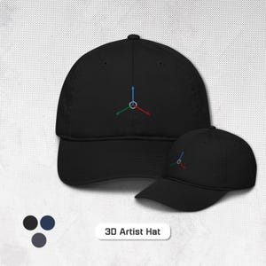 May include: Black baseball cap with a 3D coordinate system embroidered in red, green, and blue. The hat has a curved brim and a structured fit. The text "3D Artist Hat" is displayed in a white rectangle below the hats.