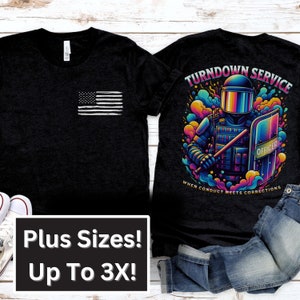 May include: Black t-shirt with a white American flag on the left side and a colourful graphic of a riot police officer with the text "Turn Down Service When Conduct Meets Corrections" on the right side.