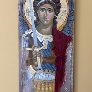 Byzantine style of Archangel Michael painted on barnwood.