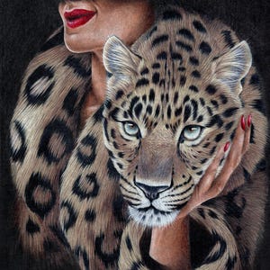 May include: A detailed illustration of a leopard's face and fur coat with black spots. The leopard is held by a person with red lipstick and nails. The artwork is set against a dark background.
