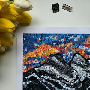 May include: A set of three ceramic mugs with a speckled, matte finish. The mugs are in shades of cream, light brown, and dark brown. Each mug has a simple, minimalist design, perfect for coffee or tea.