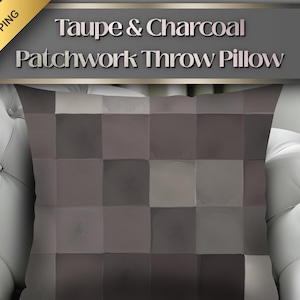 May include: Taupe and charcoal patchwork throw pillow with a grid pattern. The pillow features a mix of taupe and charcoal squares, creating a geometric design. The pillow is displayed on a white surface.