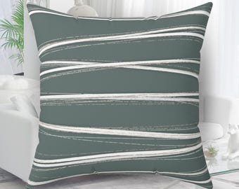 Cojín moderno con diseño de pinceladas