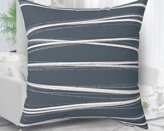 Cojín a rayas azules y blancas