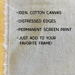May include: A close-up of a white canvas with frayed edges. The text on the canvas reads: -100% COTTON CANVAS -DISTRESSED EDGES -PERMANENT SCREEN PRINT -JUST ADD TO YOUR FAVORITE FRAME!