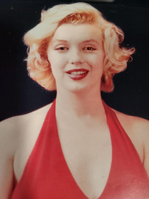 marilyn monroe red dress beverly hills Marilyn Monroe was captured wearing her dress from the film "Niagara" while attending a party hosted by Ray Anthony at his California residence. : #BernardOfHollywood #MarilynMonroe #Icon #Niagara #Party