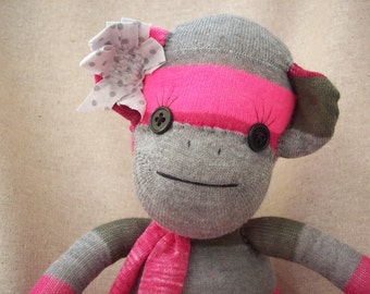 Sock monkey stuffed toy in pink stripes, handmade plush sock monkey