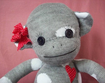 Sock monkey stuffed animal in grey polka dots, handmade sock monkey