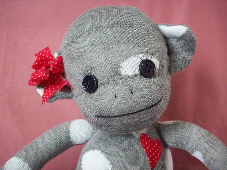 Sock monkey stuffed animal in grey polka dots, handmade sock monkey