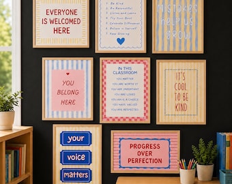 May include: A gallery wall of eight framed posters with light wood frames, featuring motivational text and colorful patterns. The prints include phrases like Everyone Is Welcomed Here, Classroom Rules, Mistakes Help Us Grow, and Progress Over Perfection.