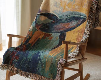 Manta tejida con textura cálida y ballena, pintura al óleo abstracta, cielo en primer plano, linda ballena, fondo de ensueño, decoración del hogar.
