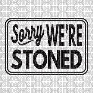 May include: Black and white rectangular sign with rounded corners. The text "Sorry WE'RE STONED" is displayed in a bold, sans-serif font. The word "Sorry" is in a cursive font.