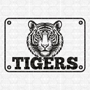 May include: Black and white graphic of a tiger's face centered above the word "TIGERS" in bold letters. The design is framed by a rectangular border with decorative corner elements. The background features a repeating pattern of the text "MSHBDesigns".