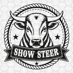 May include: A black and white graphic illustration of a steer head centered within a circular rope border. The design features two stars on the sides and one at the bottom. A banner across the lower portion contains the text SHOW STEER.