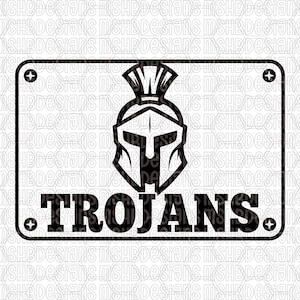 May include: Black and white graphic of a Trojan helmet and the word "TROJANS" on a rectangular sign. The sign has rounded corners and small cross-shaped details at each corner. The design is suitable for sports-themed merchandise.