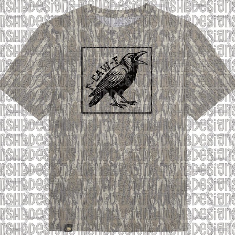 May include: A t-shirt with a camouflage pattern, displaying a black raven illustration inside a black square. The raven has an open beak, and the text "F-CAW-F" is above it. The shirt has short sleeves and a crew neck.