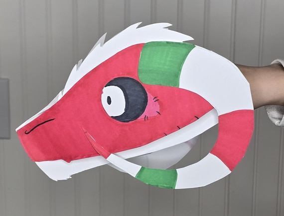 Handmade cardstock dragon puppet named Noel