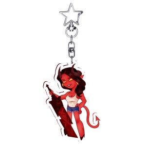 May include: A red devil-themed keychain with a star-shaped clasp. The cartoon devil figure is holding a red sword and wearing a white tank top and denim shorts. The keychain is made of acrylic and has a silver chain.