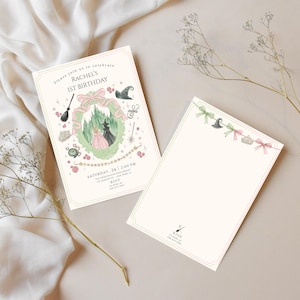 May include: Two invitation cards with a whimsical design for a first birthday. The front card features a green wreath with a witch and princess, a broom, and the text "Rachel's 1st Birthday". The back card has a decorative border.