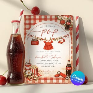 May include: A baby shower invitation with a red and white checkered background. The invitation features the text "She's Ready to Pop" and includes a red dress graphic. A bottle of cola, cherries, and a straw are in the foreground.