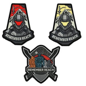 May include: Three patches with a military theme. Two patches feature a helmeted figure with the text "REMEMBER REACH". The third patch shows three figures with the same text. The patches have a black border and are in shades of gray, red, yellow, and white.