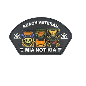 May include: Black patch with the text "REACH VETERAN" and "MIA NOT KIA". The patch features cartoon-style illustrations of six helmeted figures in various colors, including blue, green, and orange. White symbols are on each side.