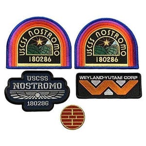 May include: A collection of five embroidered patches featuring two semi-circular USCSS Nostromo 180286 designs with rainbow borders, one dark blue shield-shaped patch with wings, one rectangular Weyland-Yutani Corp patch, and one small red circle.