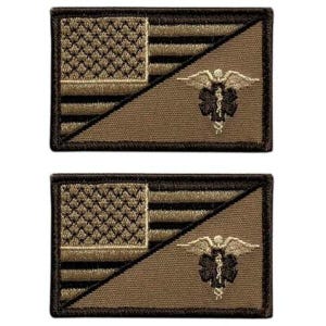 May include: Two rectangular embroidered patches featuring a stylized American flag design in shades of tan and black. The design is split diagonally, with a black and tan Star of Life medical symbol centered on the lower right portion of each patch.