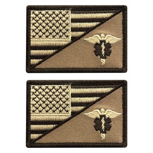 May include: Two rectangular embroidered patches featuring a stylized American flag design in shades of dark brown and tan. The design is split diagonally, with a tan medical caduceus symbol embroidered on the lower right section of each patch.