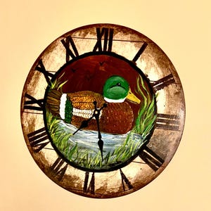 May include: A set of three ceramic mugs with a speckled, matte finish. The mugs are in shades of cream, light gray, and dark gray. Each mug has a simple, minimalist design and a rounded handle. Perfect for coffee or tea.