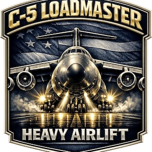 May include: A shield-shaped emblem featuring a C-5 Galaxy aircraft centered on a runway with bright landing lights. The text C-5 LOADMASTER appears in gold at the top, and HEAVY AIRLIFT is in silver at the bottom, set against a dark American flag.