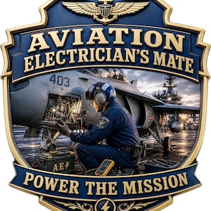 May include: A shield-shaped wall plaque featuring the text AVIATION ELECTRICIAN'S MATE and POWER THE MISSION. The center depicts a technician in a blue uniform working on a fighter jet on an aircraft carrier deck, with a yellow lightning bolt icon.