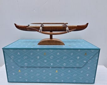Mini Hawaiian racing canoe in gift box.