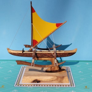 Manini racing canoe with sail