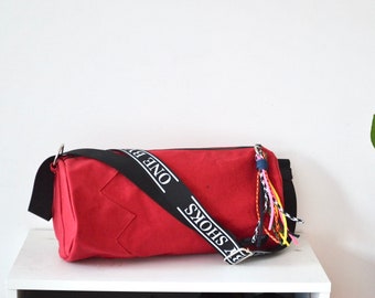 Red waxed canvas cross body