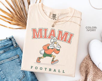 Miami Hurricanes フットボールシャツ XL マイアミハリケーンズ ヴィンテージ 90年代 マイアミ ハリケーンズ NCAA グリーン スウェット