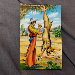 Postal vintage de un vaquero y una liebre de Texas