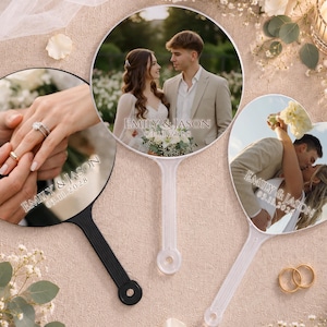 May include: Three handheld mirrors with custom photo prints. One round mirror with a black handle shows hands exchanging rings. One round mirror with a white handle shows a couple. One heart-shaped mirror with a white handle shows a couple kissing.