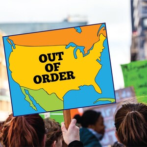 May include: A sign held up in a crowd features a map of the United States with the words "OUT OF ORDER" in bold black letters. The map is yellow, outlined in blue, with orange and green sections.