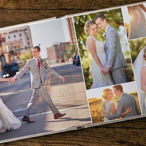 May include: A photo album open to a spread featuring multiple wedding photographs. The images display a couple in formal attire, including a white gown and a grey suit with a red tie, captured in various outdoor settings and urban locations.