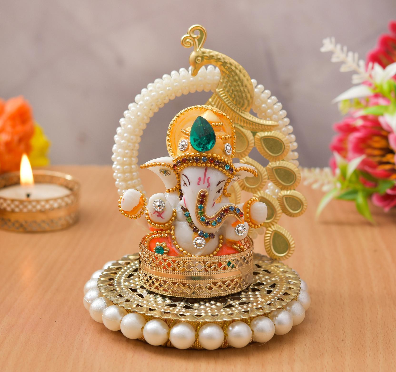 Uniqueart Golden Peacock holder TeaLight with Ganesh Idol for HomeDecor and Car Dashboard and for pooja