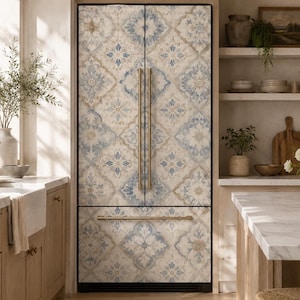 May include: A French door refrigerator featuring a decorative tile-inspired pattern in shades of blue, beige, and cream. The appliance has vertical metallic handles on the upper doors and a horizontal metallic handle on the bottom freezer drawer.