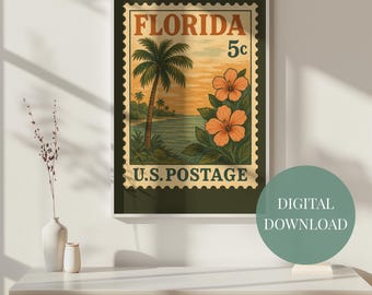 May include: A framed vintage-style print featuring a Florida postage stamp design. The artwork showcases a palm tree, ocean, and orange hibiscus flowers. The text "FLORIDA" and "U.S. POSTAGE" are visible.