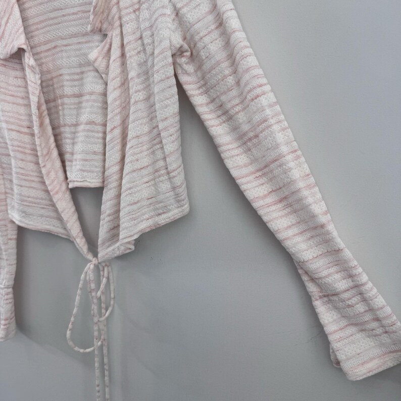 Cárdigan de punto estilo boho, color rosa marfil, abierto por delante, de Free People, talla XS. imagen 3