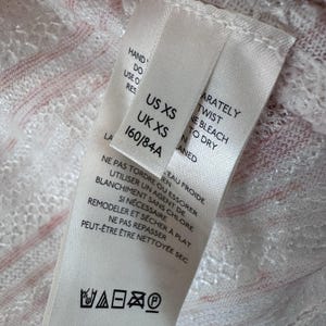Cárdigan de punto estilo boho, color rosa marfil, abierto por delante, de Free People, talla XS. imagen 7