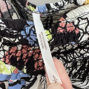 Top tomara que caia estilo boho camponês com modelagem franzida em rayon da Free People. imagem 5