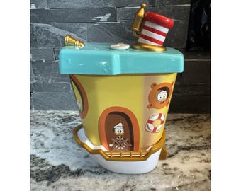 ヴィンテージのドナルドダックディズニーウォーターディスクおもちゃ
