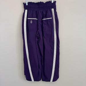 Pantaloni da jogging da donna Free People FP Movement, taglia media, colore ametista scuro, modello Wayside, NUOVI immagine 7