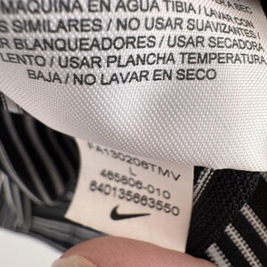 Polo Nike Golf Dri Fit para hombre, talla L, negro, blanco, rayas Swoosh. imagen 8